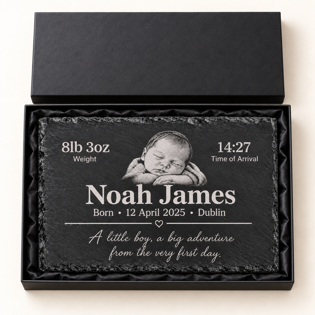 Personalised 30 cm wide by 20 cm high baby birth slate plaque with example Noah James engraving in an open black presentation gift box