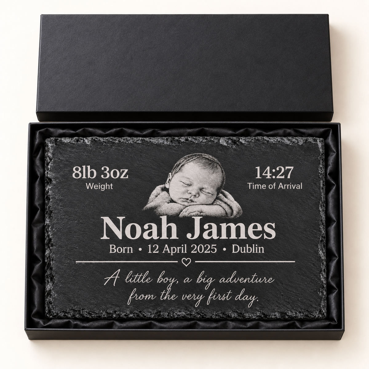 Personalised 30 cm wide by 20 cm high baby birth slate plaque with example Noah James engraving in an open black presentation gift box